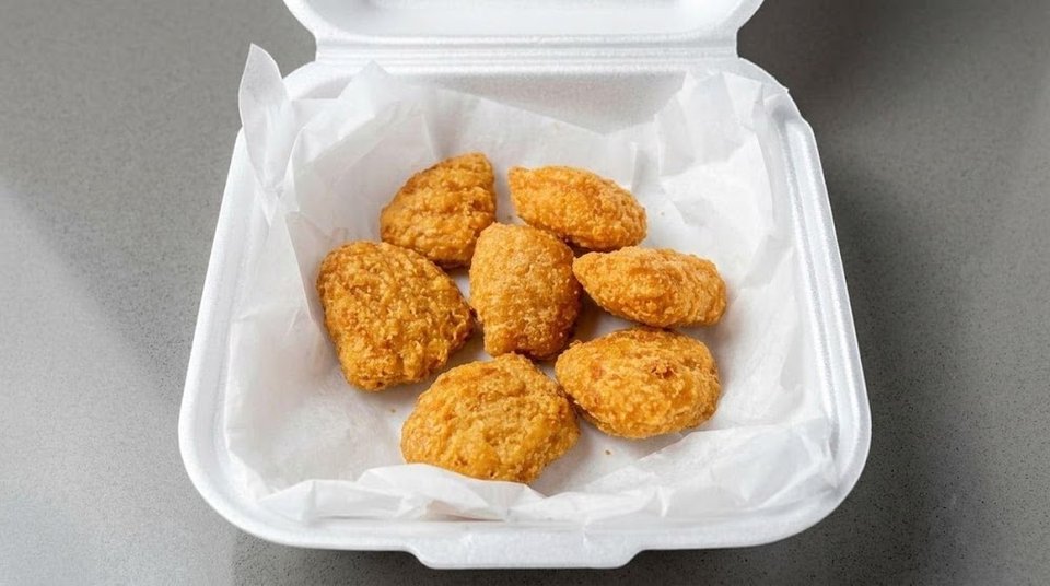 Printed menu with fried chicken and shrimp options.